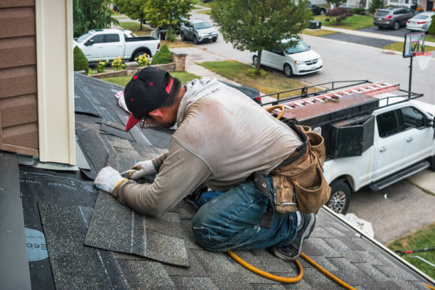 Professional Roofing technician working in Redgranite, WI